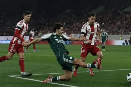 Παίκτες του Ολυμπιακού σε φάση απο τον αγώνα