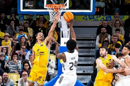 αίκτες της μπασκετικής Ρεάλ Μαδρίτης σε αγωνιστική δράση κόντρα στην Γκραν Κανάρια, εν μέσω της μεγάλης οικονομικής κρίσης του συλλόγου.