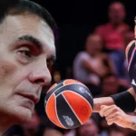 Ο Αμερικανός γκαρντ Ρόντεν σε αγωνιστική δράση με τη φανέλα της Παρί υπο το βλέμμα του Γιώργου Μπαρτζώκα