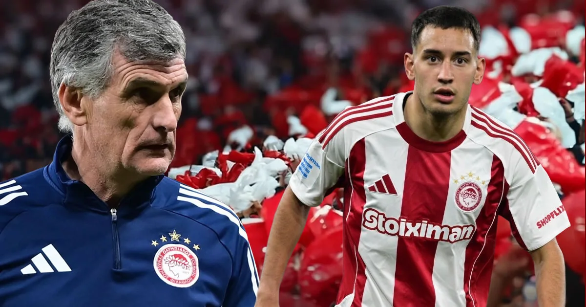 Ο Σαντιάγκο Έσε με τη φανέλα του Ολυμπιακού μαρκάρει δυναμικά αντίπαλο σε αγώνα της SuperLeague