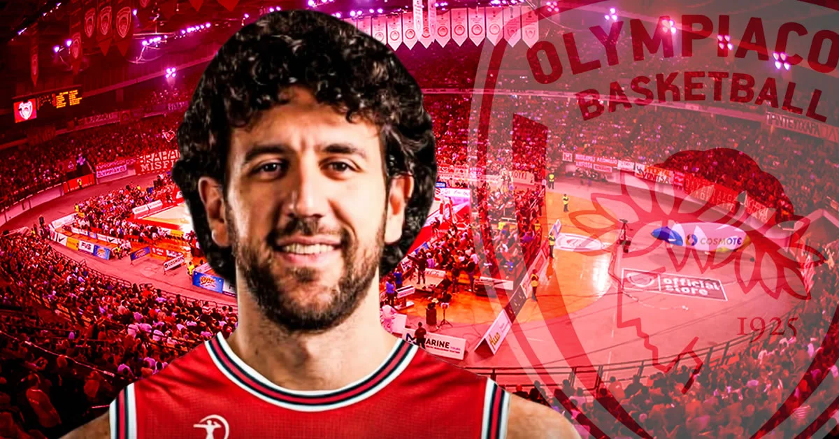 Ο Βασίλιε Μίσιτς πιάνει το γόνατό του φανερά προβληματισμένος κατά τη διάρκεια αγώνα μπάσκετ.